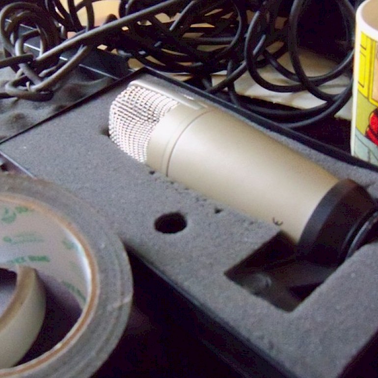 Gaffer tape, microphone and mug of tea.